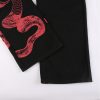 Pantalon serpent detail
